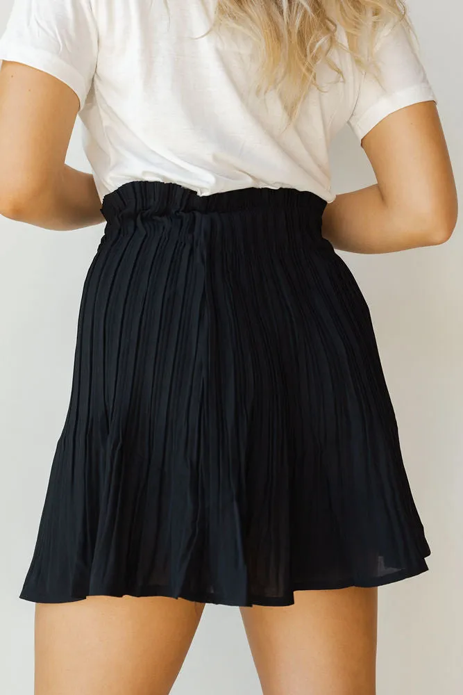 give your all flowy pleated mini skirt